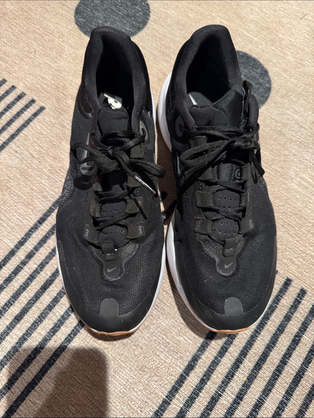 Nike Women's Black Sneakers with White Sole